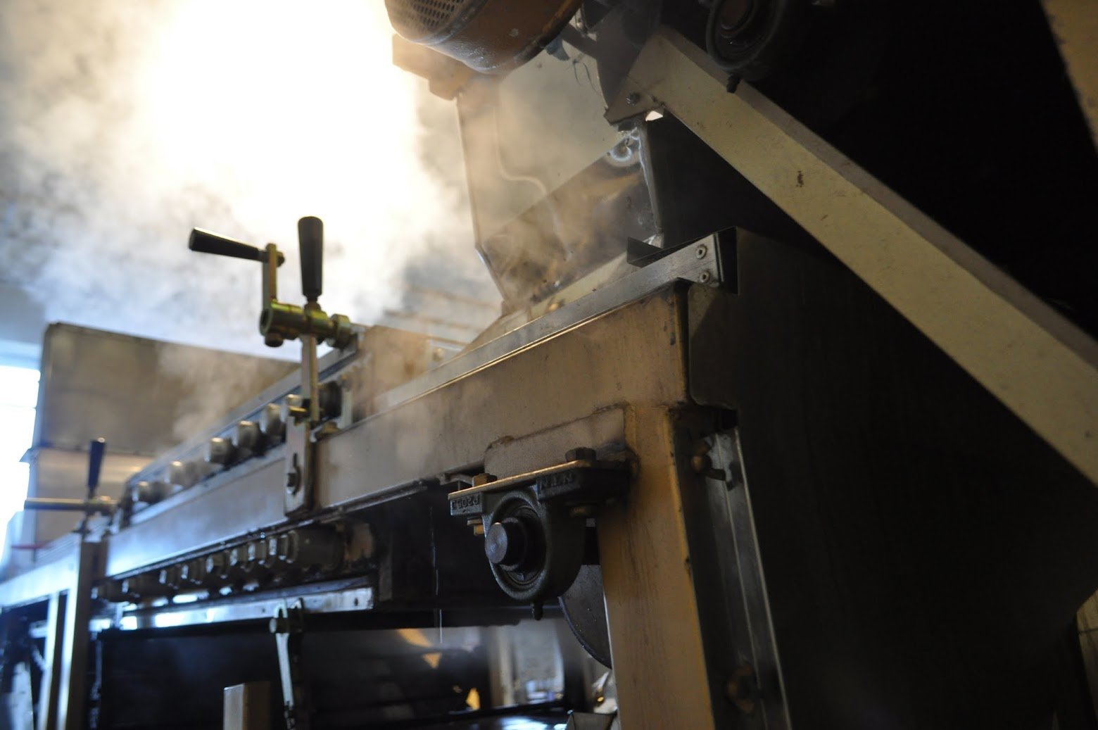 Steam rising from a fukamushi steaming machine in Yaizu